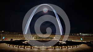 Gateway arch national park st louis MO at night with the moon