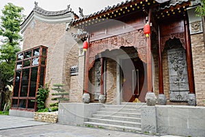 Gateway with bass-relief of old-fashioned Chinese building