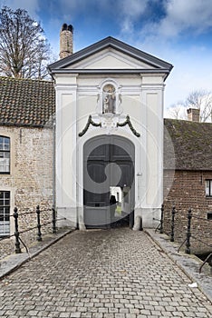 Gateway into Begijn Huisje convent Bruges