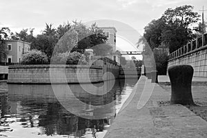 Gateway on the river in summer black and white