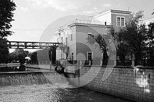 Gateway on river on summer day black and white