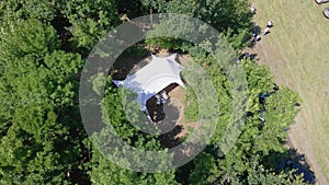 Gathering of a group of farmers in the fields. aerial video