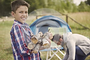 Gathering wood for campfire