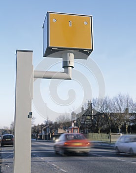 Gatso speed camera with speeding vehicles