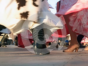 Gaucho and dancing compatriot