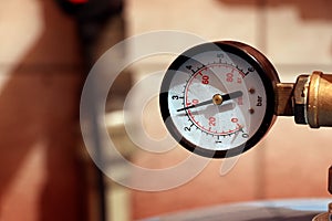 A gauge, manometer, gage on a bright background. Pressure sensor manometer