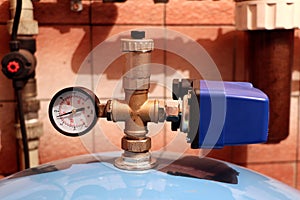 A gauge, manometer, gage on a bright background. Pressure sensor manometer