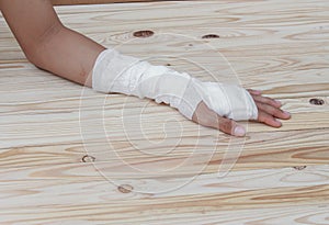 Gauze bandage the hand wound. treating patients with hand