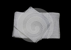 Gauze pads on the black background