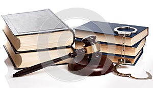 Gavel, books and handcuffs