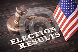 Gavel with election results photo