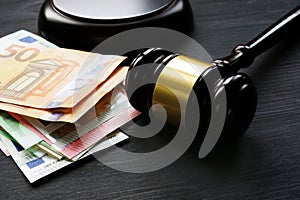 Gavel and euro banknotes. Bail bond or penalty in EU.