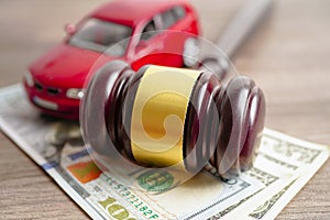 Gavel for judge lawyer with car on US dollar money banknotes, Car loan, Finance, saving money, law, insurance and leasing time