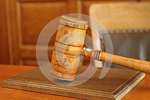 The gavel of justice in a court room