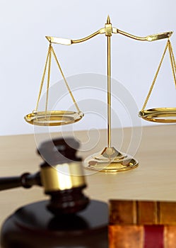 Gavel and legal Judge gavel scales of justice and law working on