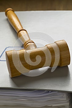 Gavel on a map with papers