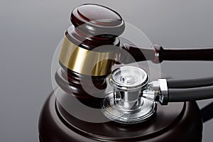 Gavel and medical stethoscope