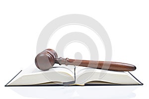 Gavel over the opened law book photo