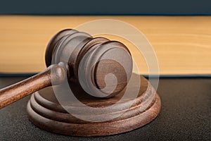 Gavel and sounding block close up. Wooden hammer. Justice and law concept