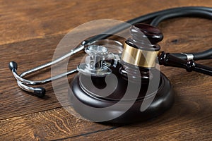 Gavel And Stethoscope On Table