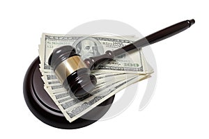 Gavel whith dollars on a white background