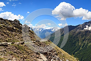 Gavia pass road with panorama view alpine mountains Adamello Alps