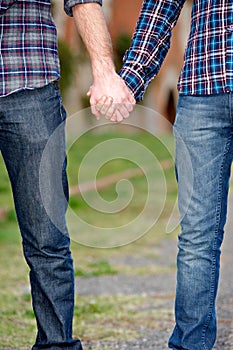 Gay Couple Outdise Holding Hands