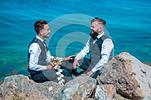 Gay couple wedding. Lgbt gay marriage couple having romantic moment together after wedding ceremony. Concept of LGBTQ