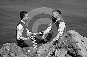 Gay couple wedding. Lgbt gay marriage couple having romantic moment together after wedding ceremony. Concept of LGBTQ