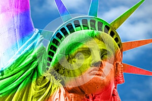 Gay equal rights and LGBT sexual freedom in America concept with the statue of liberty covered in the rainbow colors. LGBTQ
