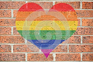 Gay heart on brick wall