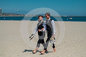 Gay man groom at wedding. Same-sex marriage and love concept. Happy gay couple on wedding. Gay grooms walking together