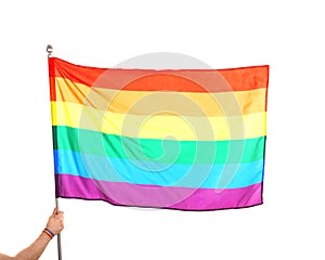 Gay man holding rainbow LGBT flag