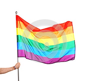 Gay man holding rainbow LGBT white background