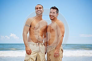 Gay men at the beach photo