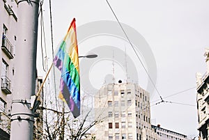Gay pride flag on lamppost