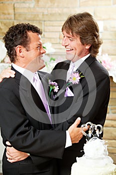 Gay Wedding Couple Embrace photo