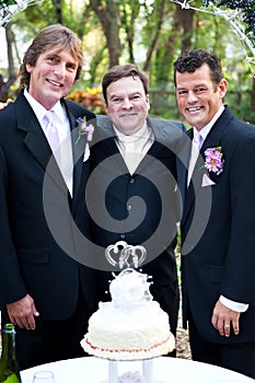 Gay Wedding Couple with Minister photo