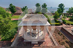 Gazebo at beautiful decorated garden of Jaswant Thada cenotaph. Garden has carved gazebos, a tiered garden, and a small lake with