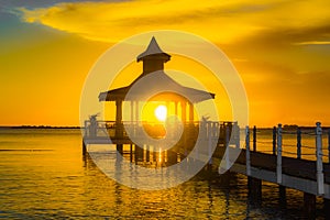 Gazebo bridge sea at sunset