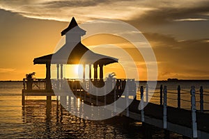 Gazebo bridge sea at sunset