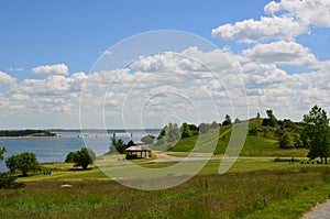 Gazebo and Fluffy Clouds on Spectacle Island in Boston Harbor photo