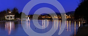 Gazebo on Lake with Light Reflections