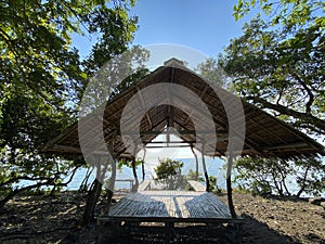 Gazebo, rest zone for a picnic, relaxation, meditation,massage.Secluded place from the sun or rain in forest near sea