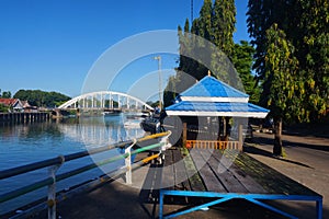 gazebo by the river and tree-lined atmosphere