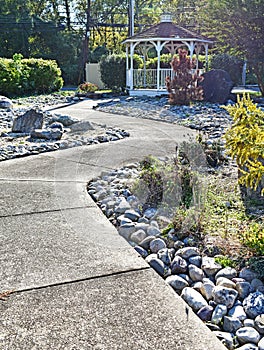 Gazebo with Rock and Evergreen Plant Landscaping