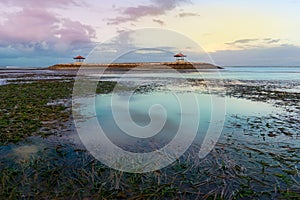 Gazebo in sanur beach during sunset