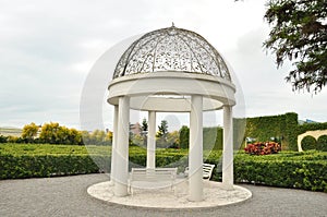 Gazebo in summer garden.