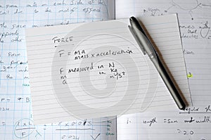 GCSE physics revision with flash cards and exercise book
