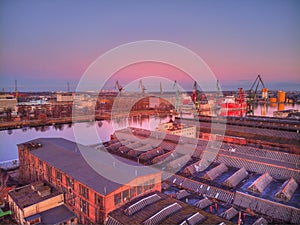 GdaÃâsk shipyard cranes at evening